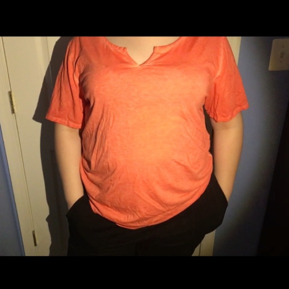 Short sleeved salmon colored women’s shirt